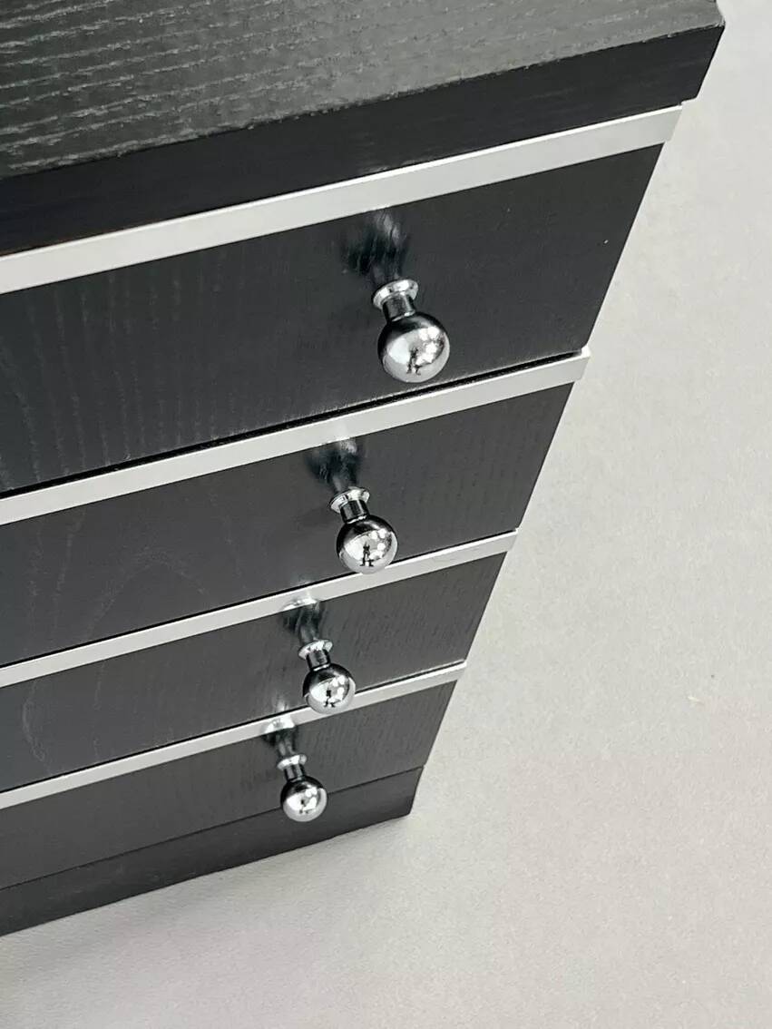 Pair of black and chrome 4-drawer chests of drawers