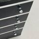 Paire de commodes 4 tiroirs noires et chrome