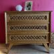 60s rattan and compass feet dresser