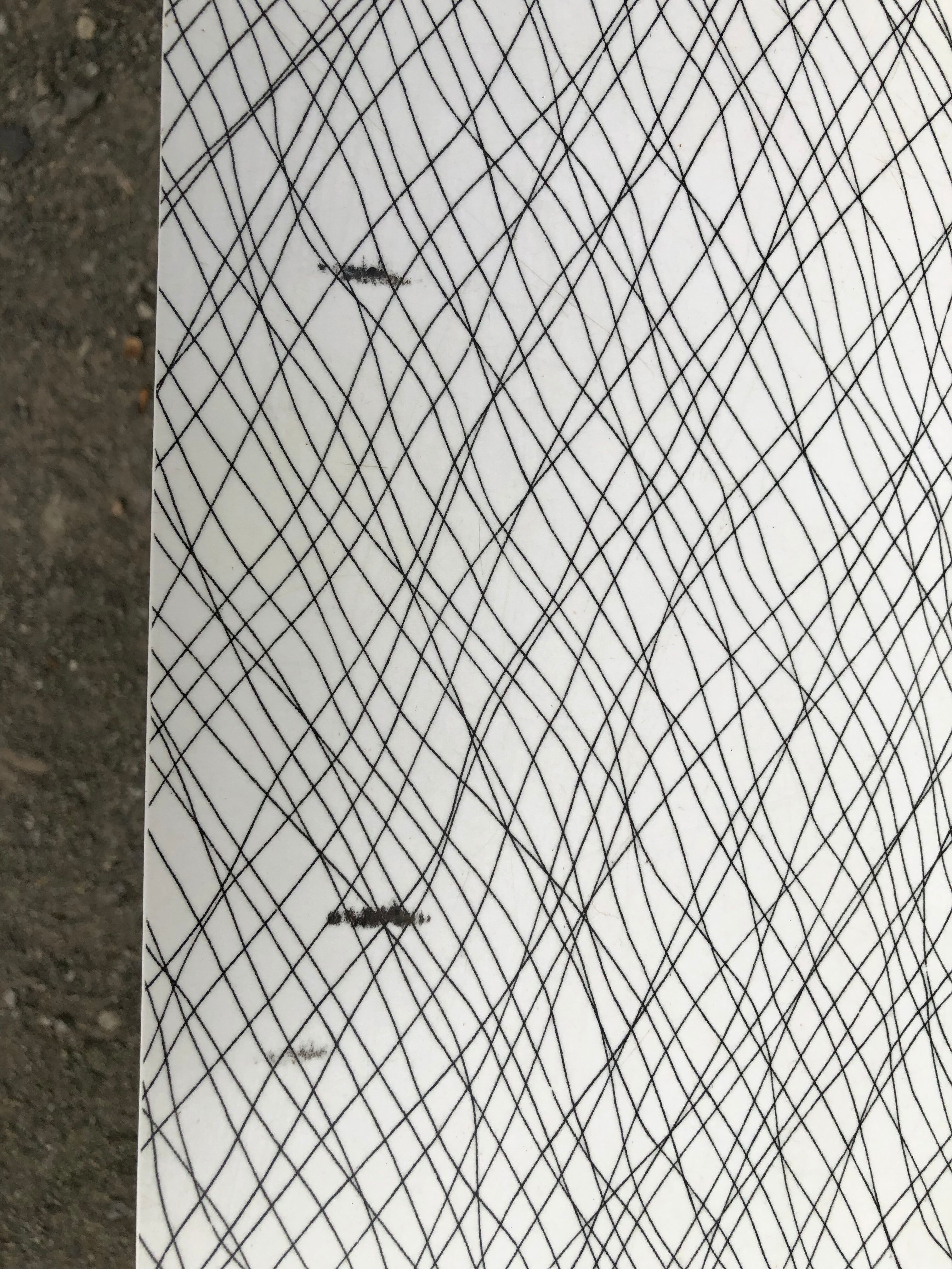 Vintage bistro table with an Art Deco style cast iron base and Formica top.