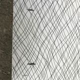 Vintage bistro table with an Art Deco style cast iron base and Formica top.