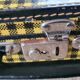 Antique suitcase in vintage yellow and black cardboard