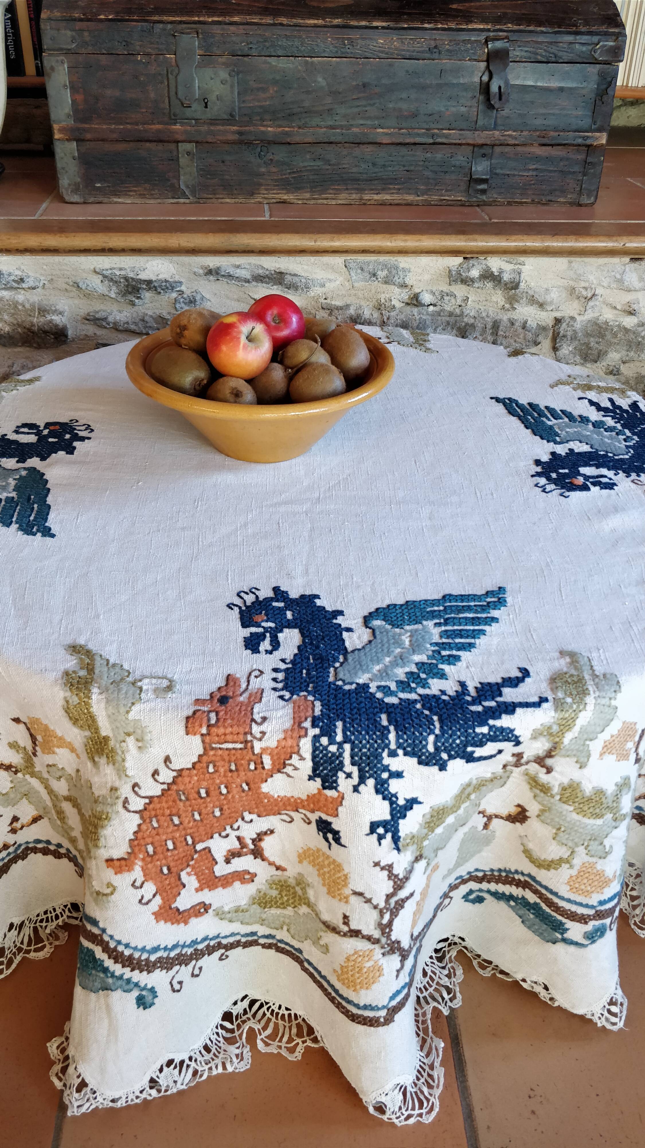 Round embroidered linen tablecloth