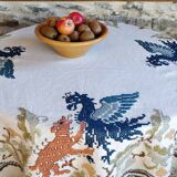 Round embroidered linen tablecloth