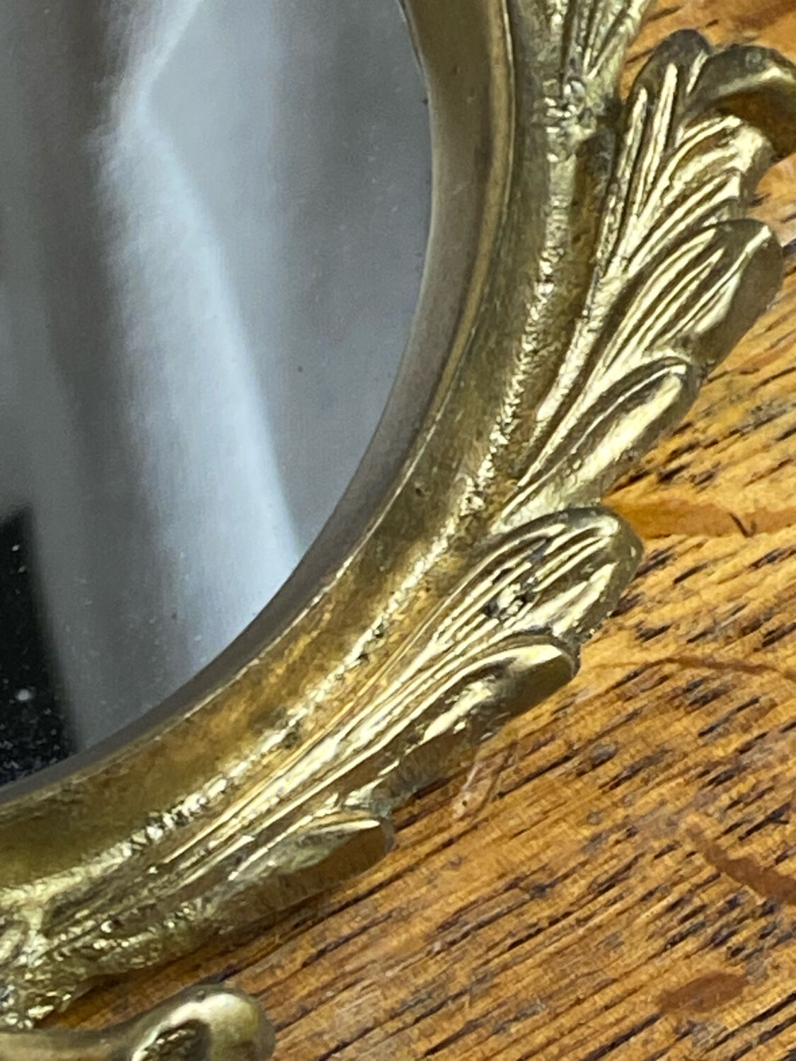 Small antique bronze mirror