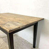 Varnished farmhouse table and blackened wood