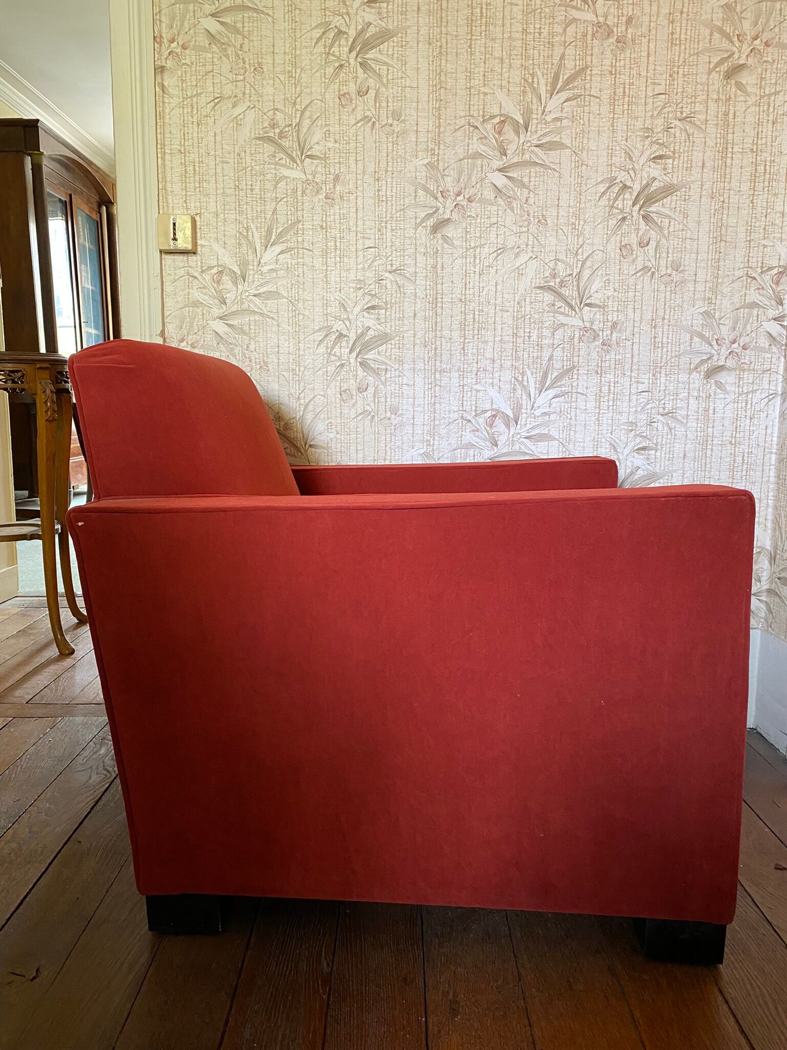 Vintage cubic armchair covered with red fabric