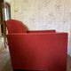 Vintage cubic armchair covered with red fabric