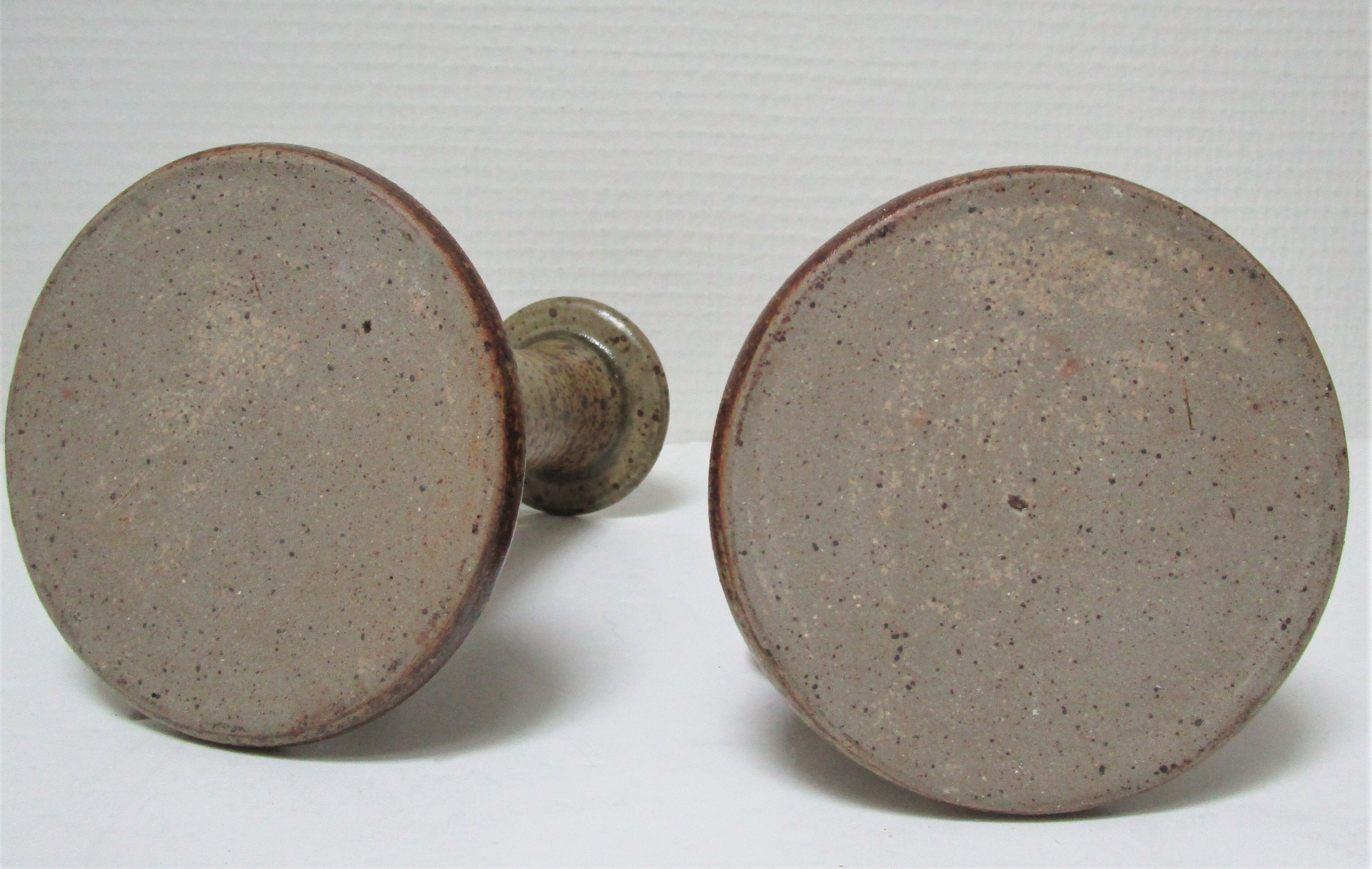 Pair of vintage sandstone candlesticks
