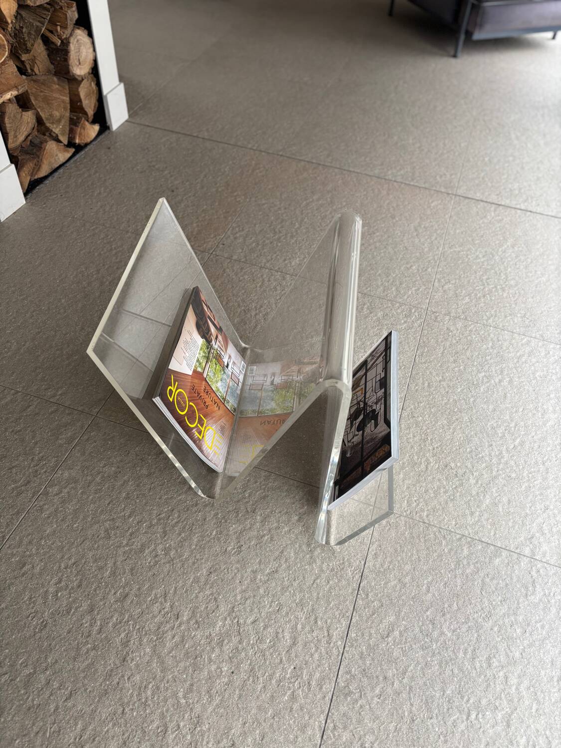 Asymmetrical design magazine rack in transparent acrylic, 70s