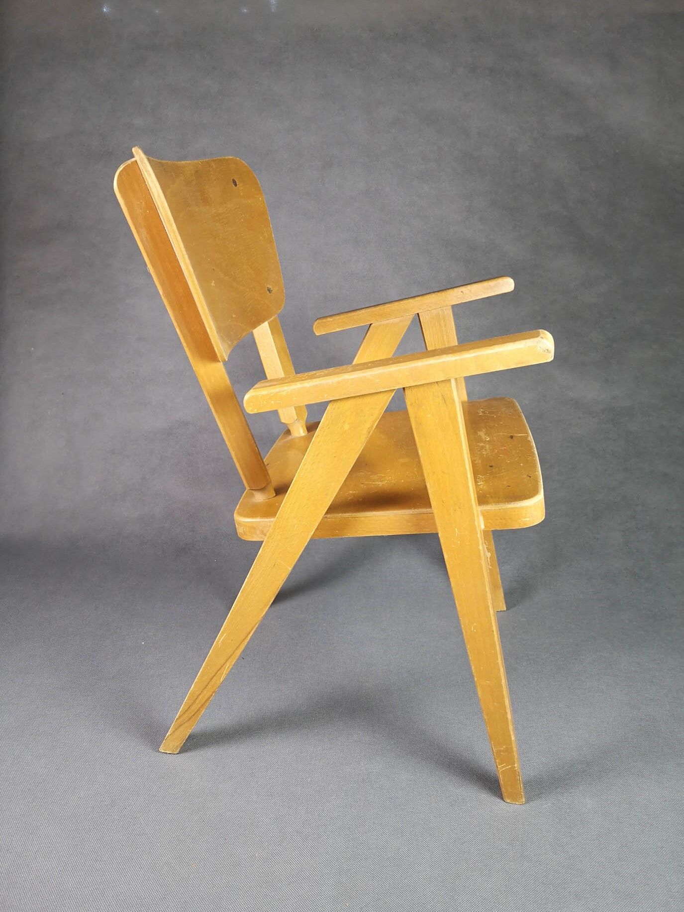 Vintage armchair child feet compass light wood