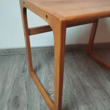Sled-shaped side table