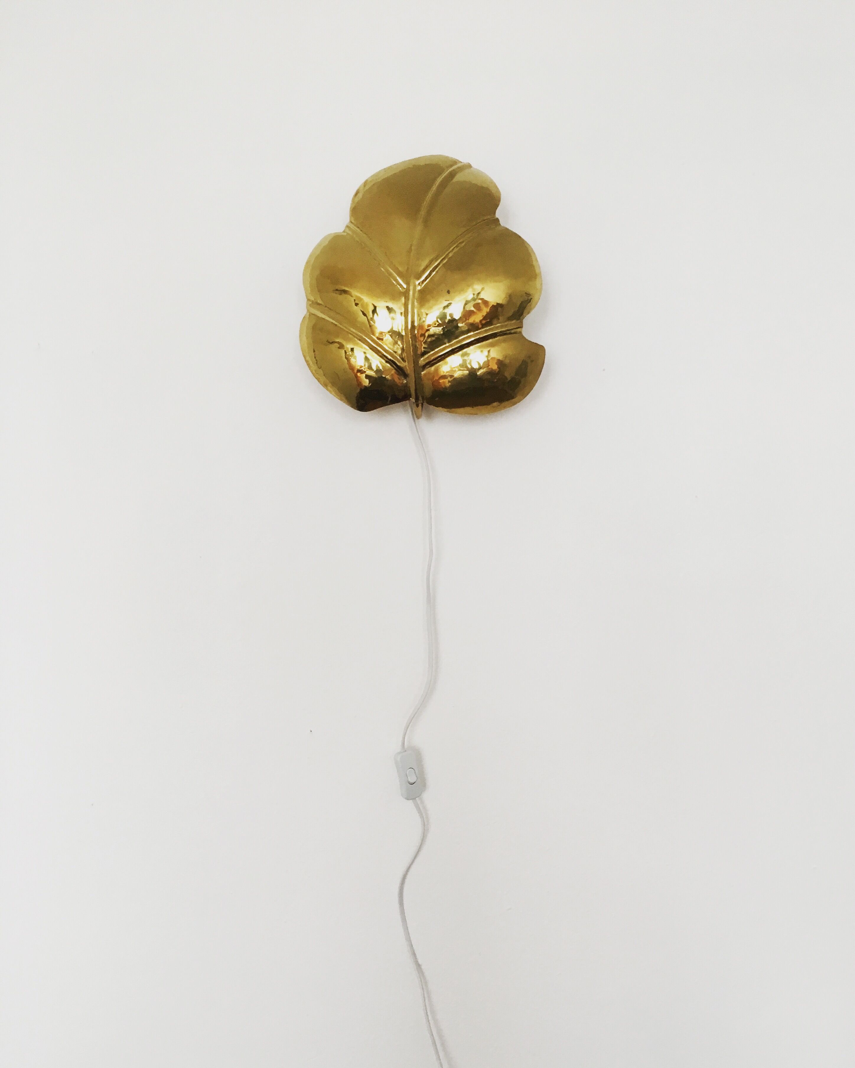 Hollywood Regency brass leaf wall lamp