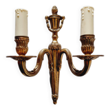 French Empire-style wall sconce or chandelier in bronze with an antique gold patina.