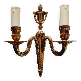 French Empire-style wall sconce or chandelier in bronze with an antique gold patina.