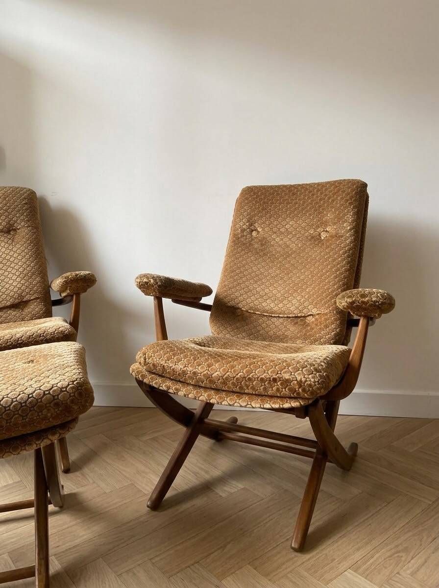 Pair of vintage 70s armchairs in brown and orange velvet with footrest.