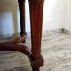 Oval wooden table with extensions