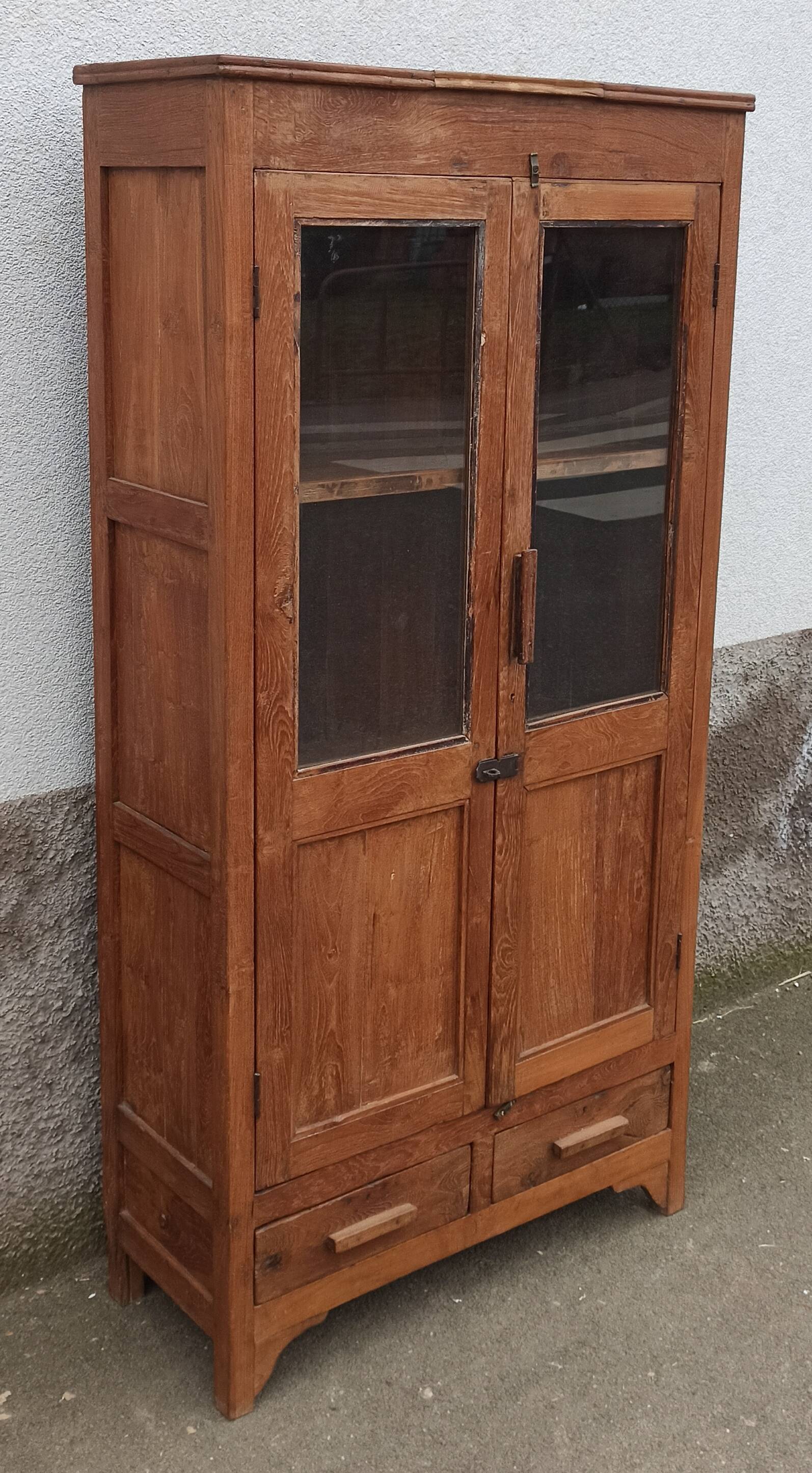 Old glazed teak cabinet