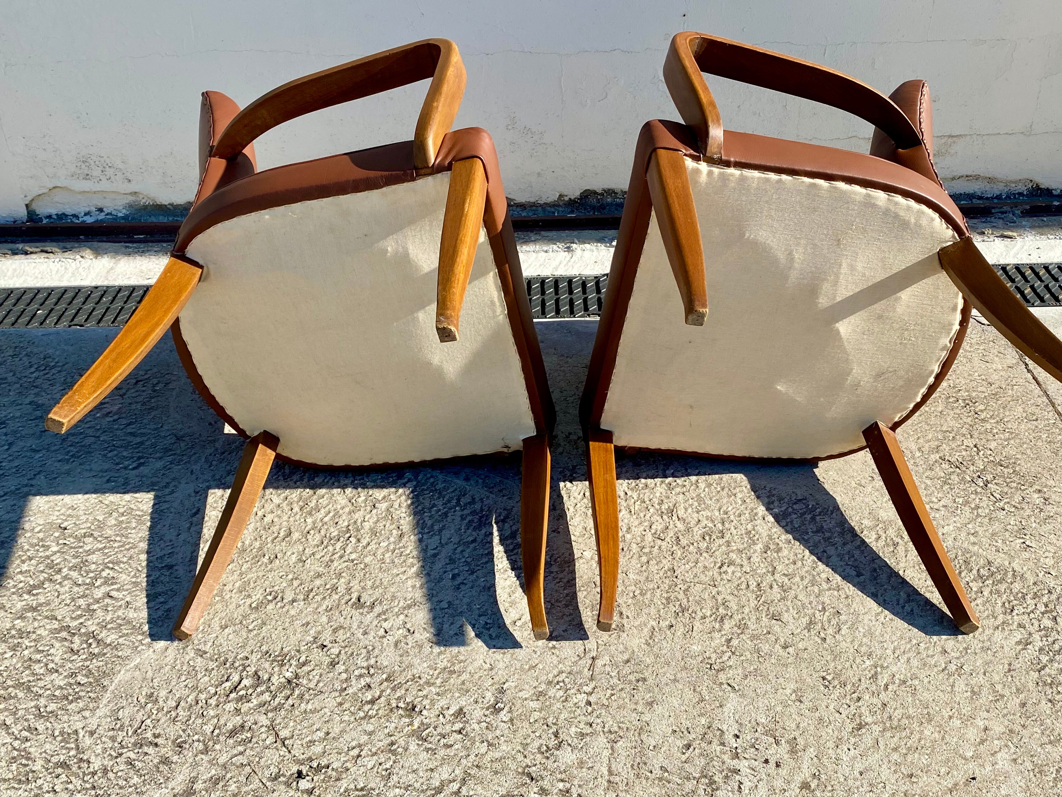 Pair of 50s bridge armchairs