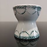 Old porcelain diabolo egg cup decorated with green frieze and garlands