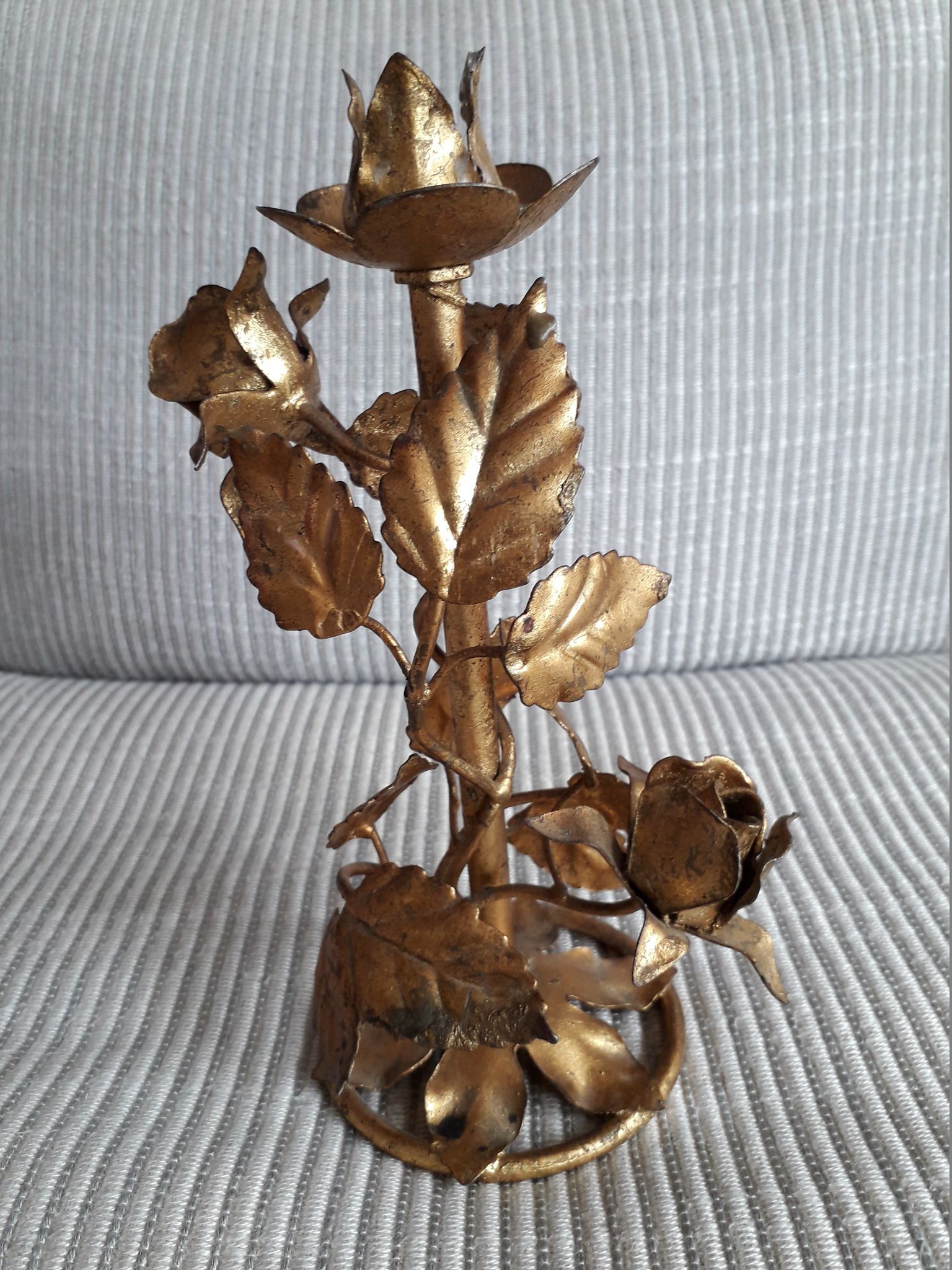 Vintage vegetable candle holder with a decoration of roses and golden leaves