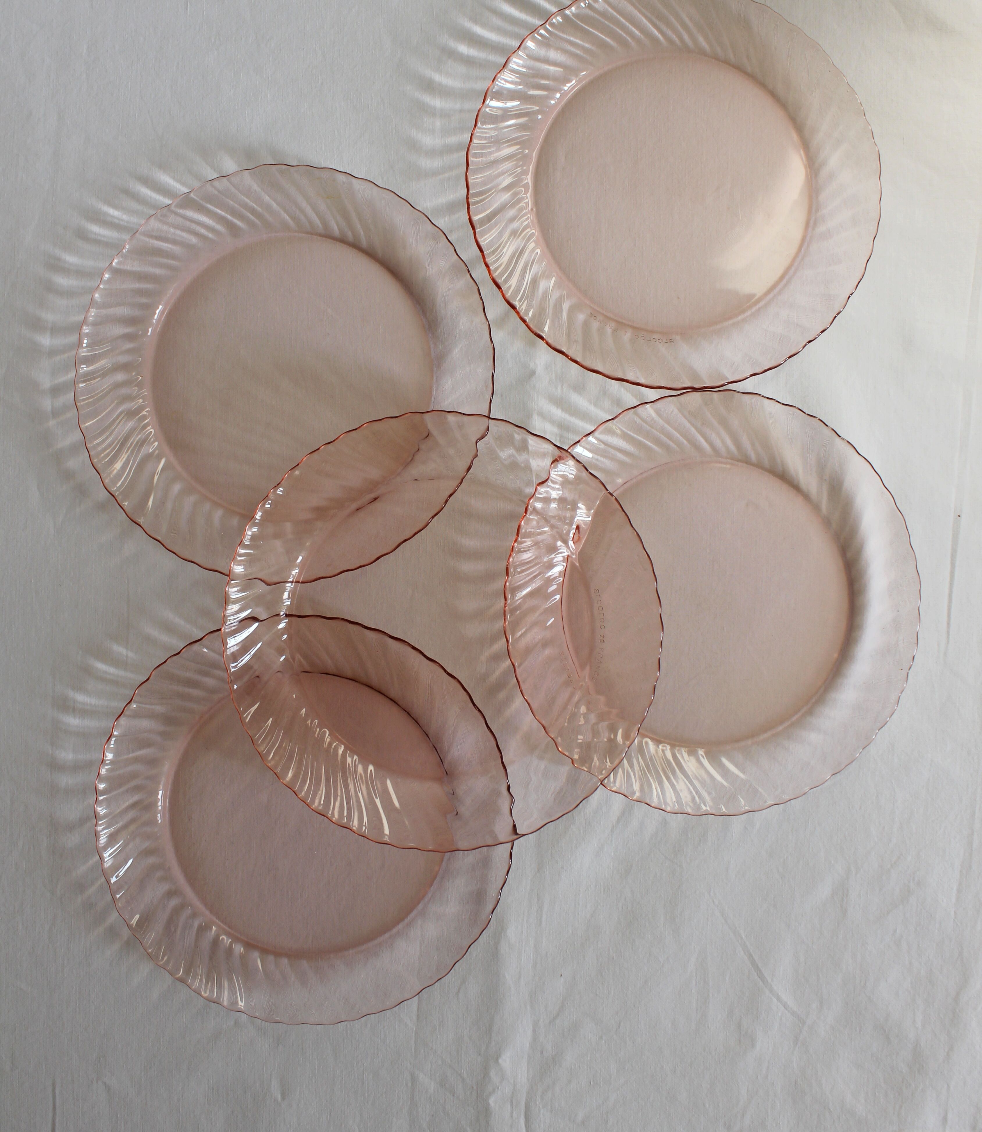 5 vintage Rosaline dessert plates in pink glass