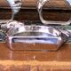 Four silver-plated napkin rings in the shape of a duck/goose