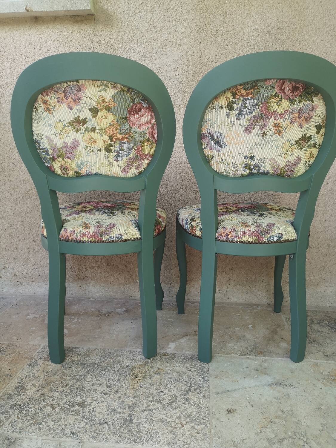 Antique chairs with studded upholstery.