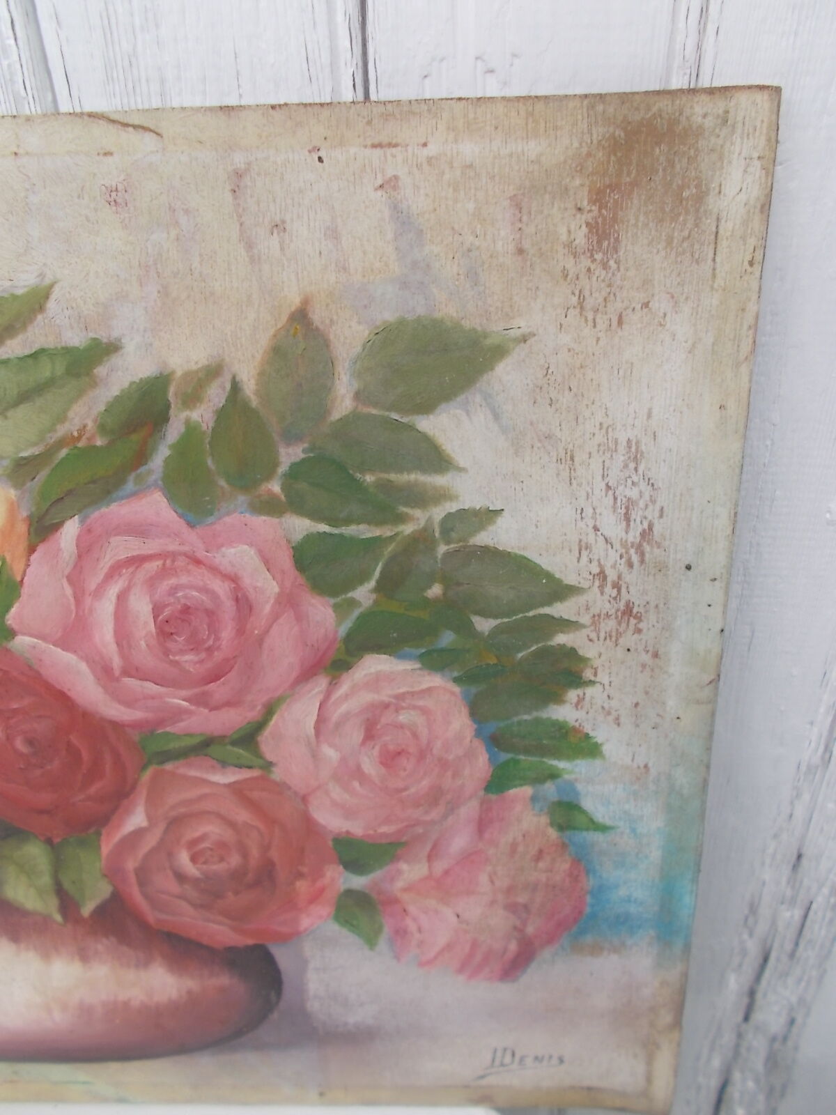 Tableau of a bouquet of flowers on a double-sided wooden panel.