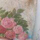 Tableau of a bouquet of flowers on a double-sided wooden panel.