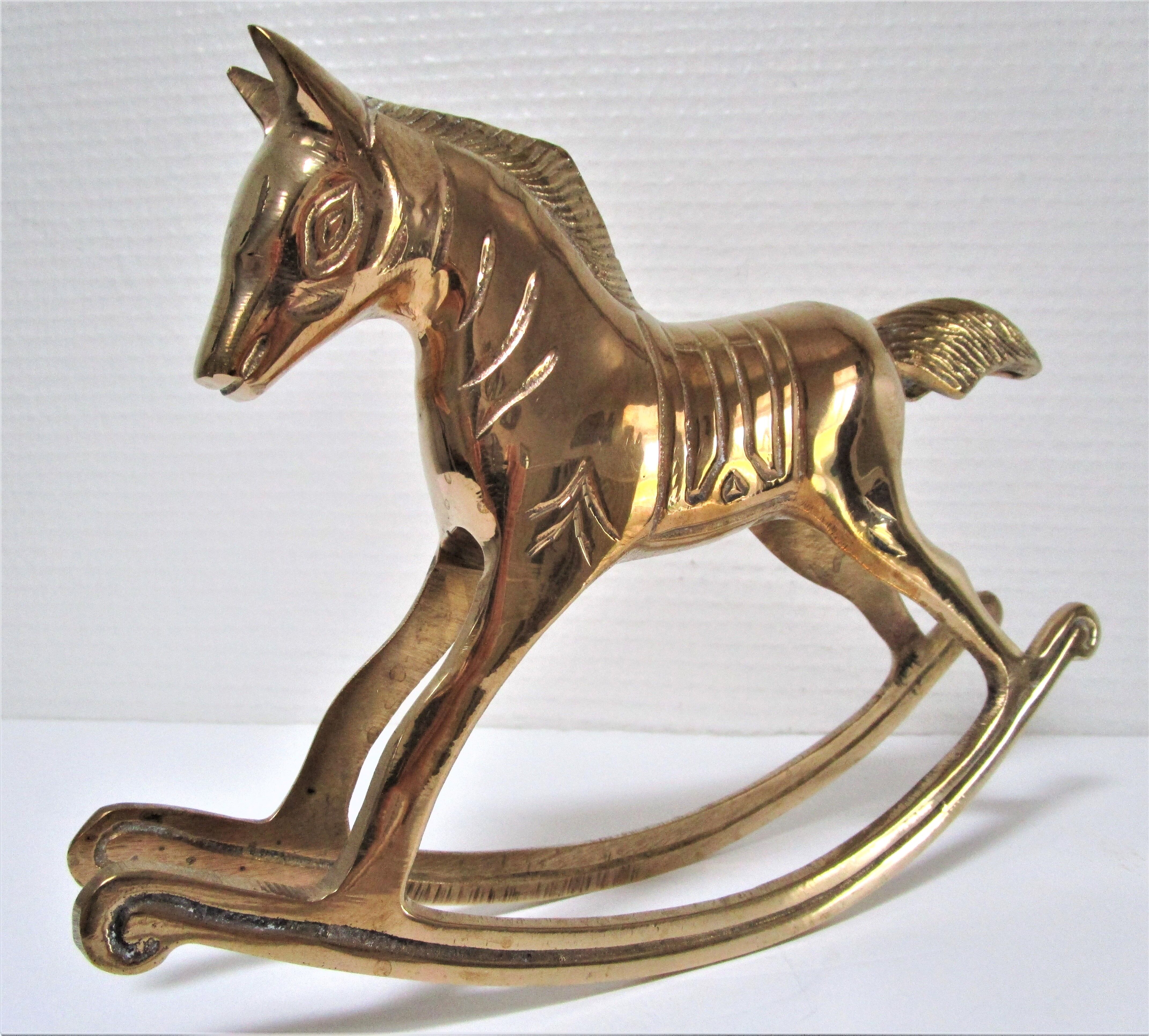 Vintage brass rocking horse 70
