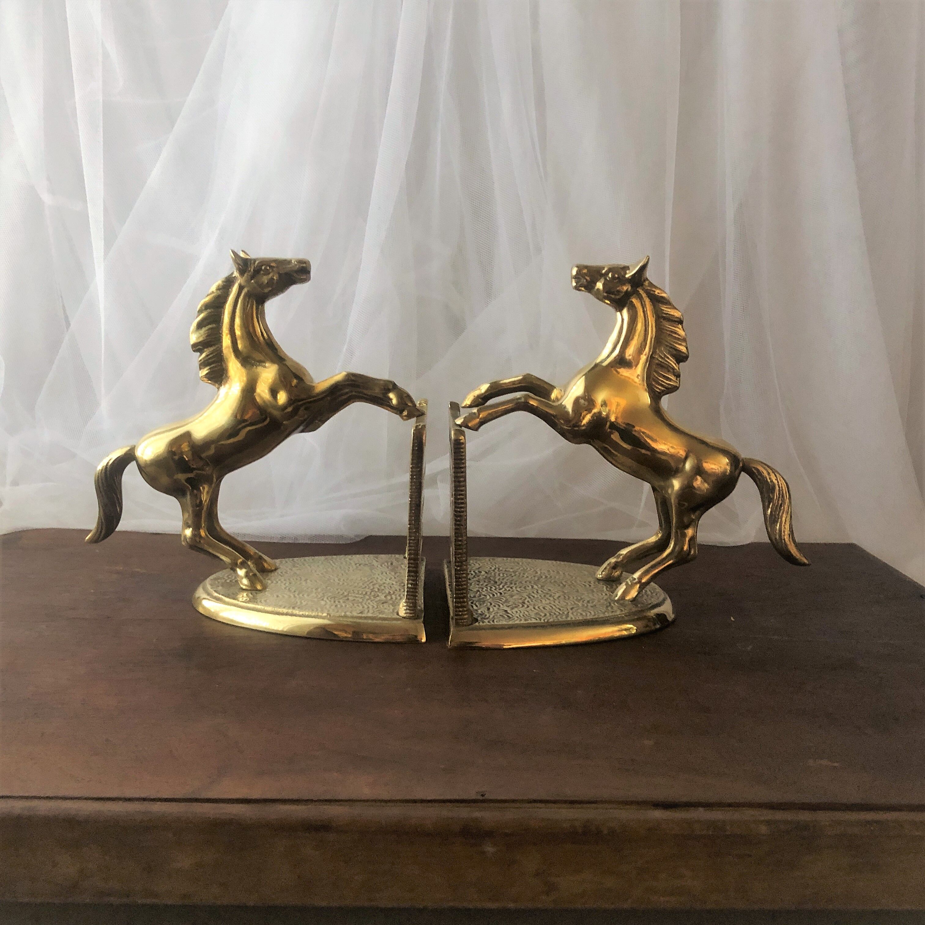 Goldeneye brass décor horses