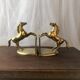 Goldeneye brass décor horses
