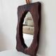Brutalist antique mirror in solid wood from the 1950s/60s.
