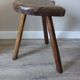 Cowhide tripod stool