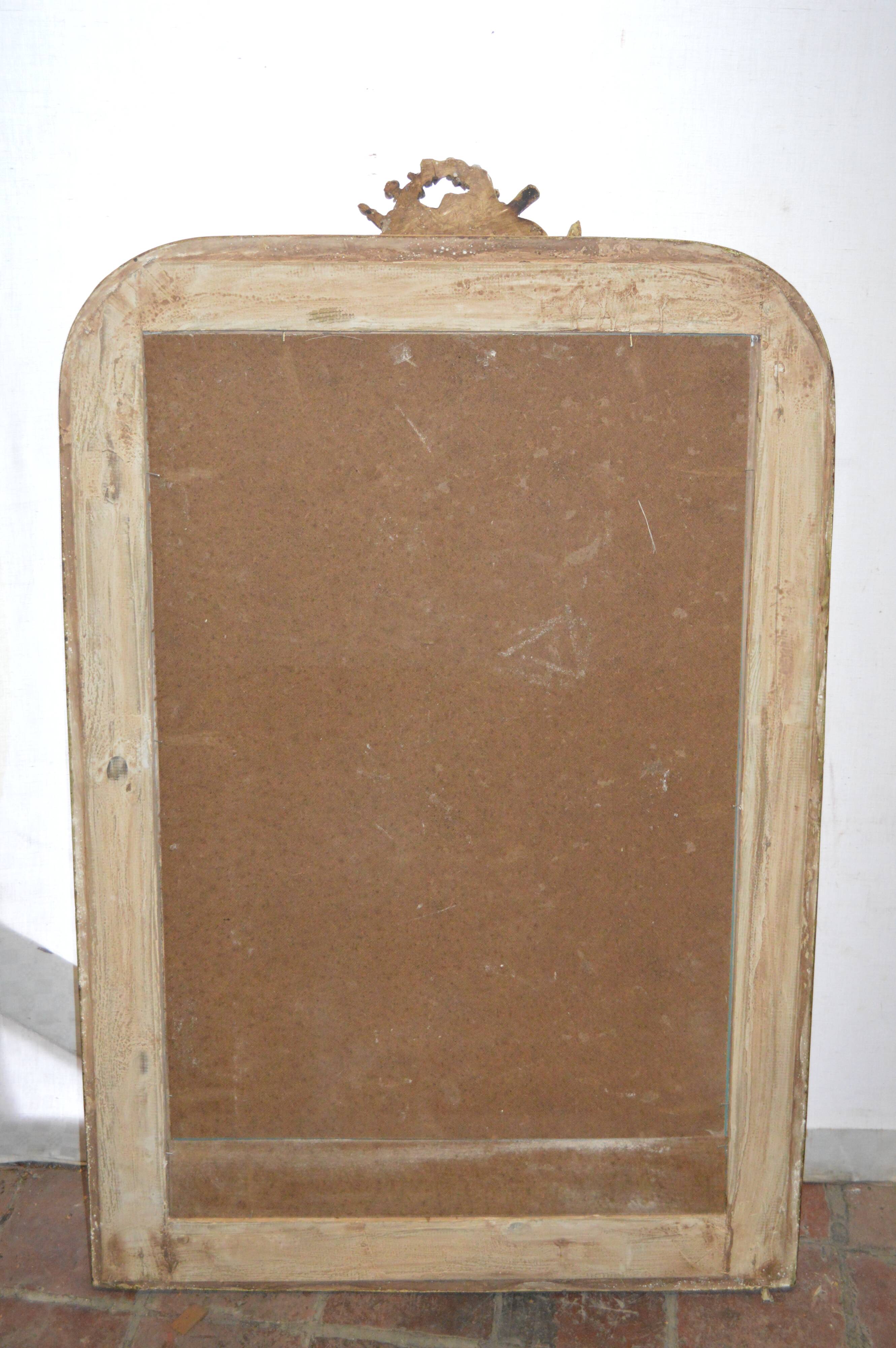 Mirror gilded with musical instruments 75x116cm