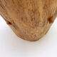 Brutalist sculptural chair in solid oak in wabi-sabi style.