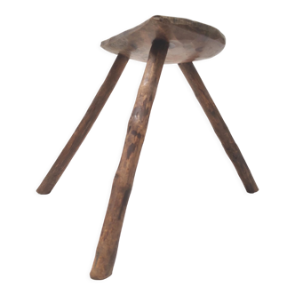 Brutalist tripod stool in solid wood half round