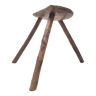 Brutalist tripod stool in solid wood half round