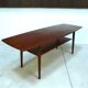 Curved Danish teak coffee table with additional shelf compartment, 1960s