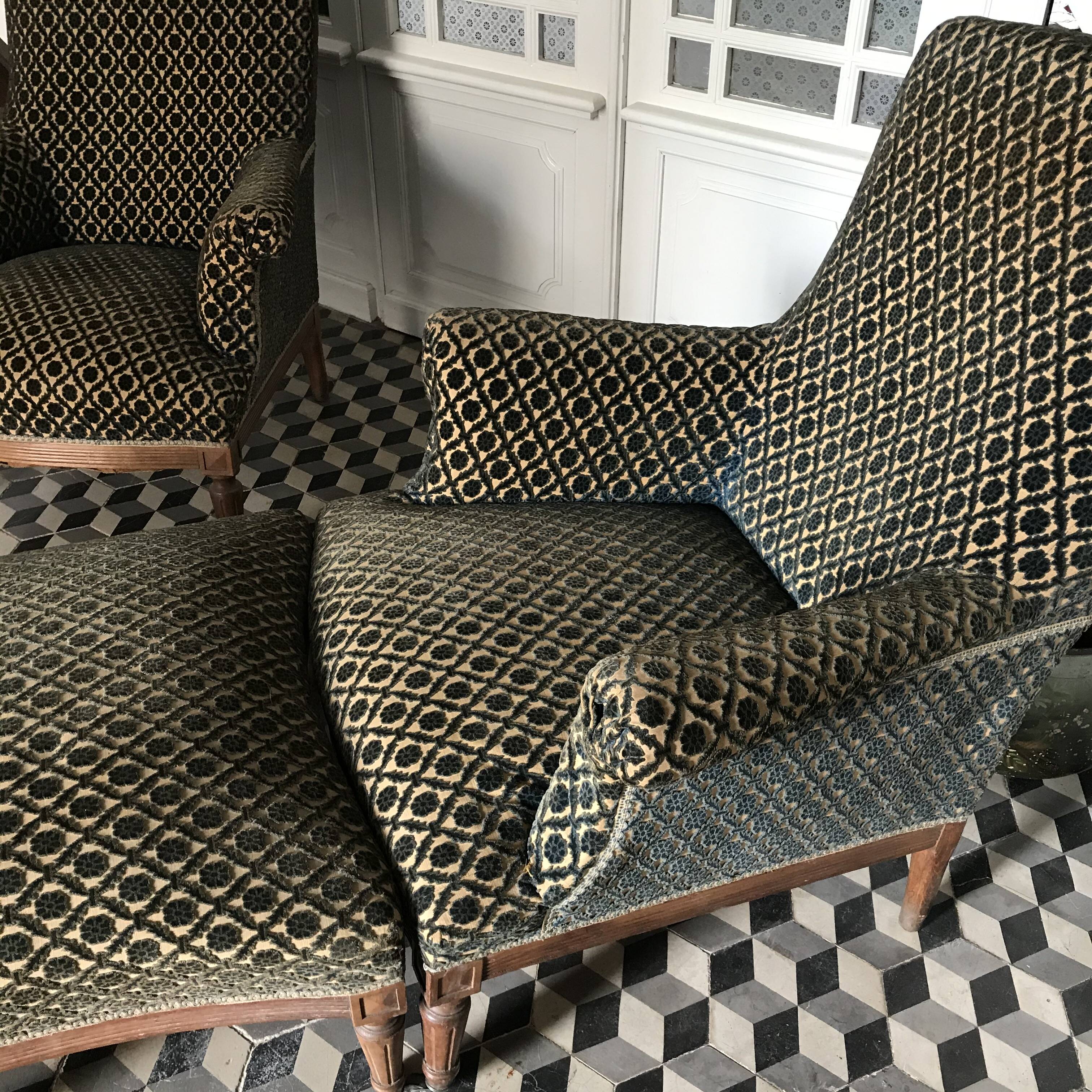 Vintage armchairs and rests feet