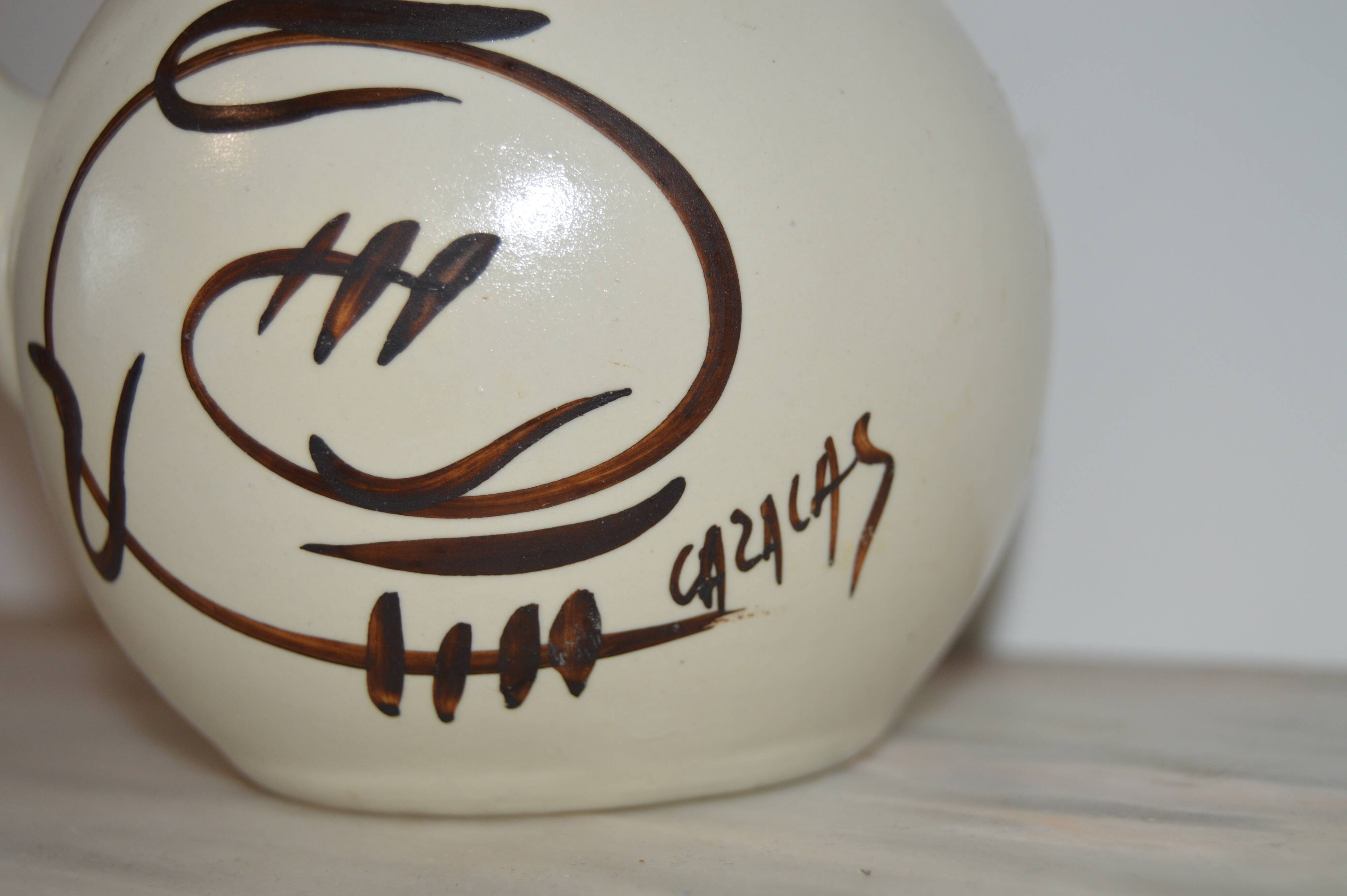 Ceramic pitcher signed Cazalas
