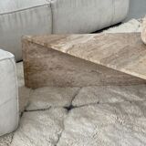 Pair of triangular travertine tables