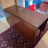 Vintage drop-leaf mahogany table; ideal for decorators.