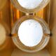 Pair of gold metal and frosted glass sconces