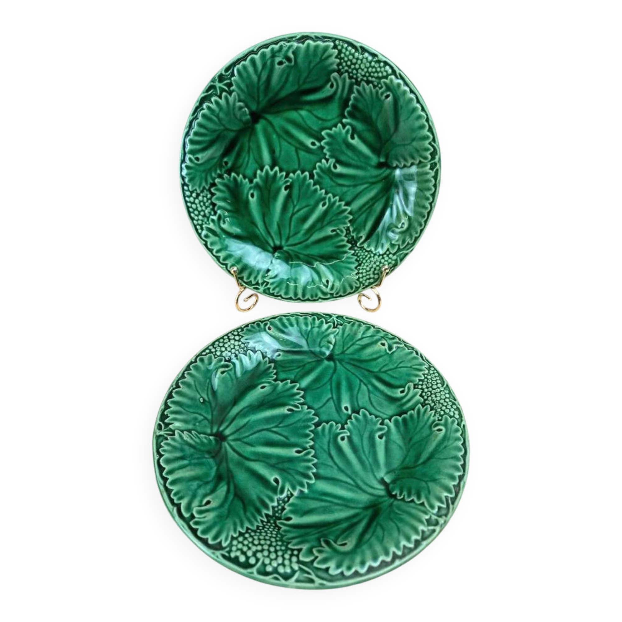 Set of 2 green earthenware dessert plates with vine decoration.