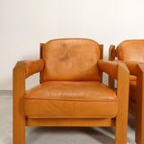 2 fauteuils en chêne et cuir cognac par Skilla