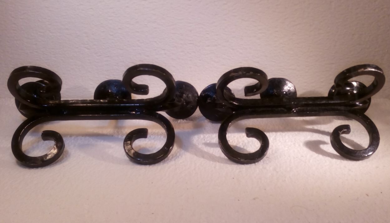 Pair of sconces in wrought iron