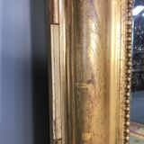 Louis Philippe's era mirror with a gold leaf pediment