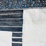 Handmade white and black Berber rug